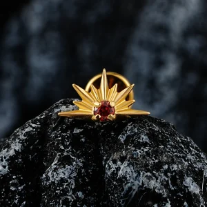 Starburst ear stud with a red cz stone titanium piercing labret