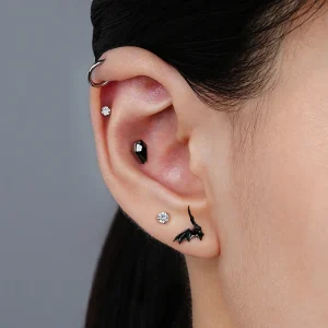 Bat stud earring with a flying bat in black silver and gold titanium Halloween ear piercing