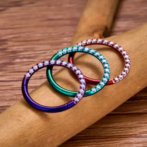 Classy small septum piercing with clear cz in red green purple