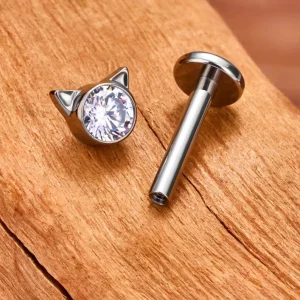 Cat ear piercing with a clear pink or blue cz stone titanium 16G
