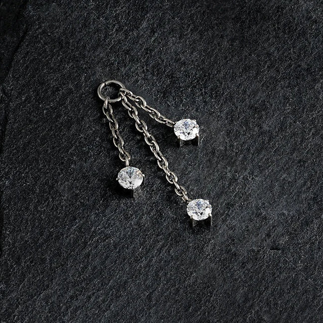 Chain charm for ear piercings with three clear stones and three chains - Image 2