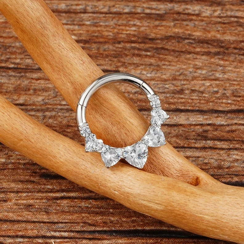 Daith hoop with five heart-shaped clear cz stones titanium 16G septum ring