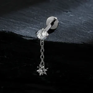 Dangling flat piercing with a spiked ball and clear cz titanium labret stud