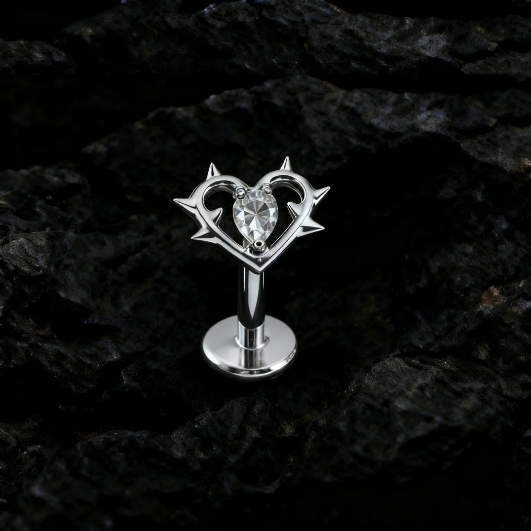 Spiked heart earring with a clear pink red green black stone heart nose piercing stud - Image 2